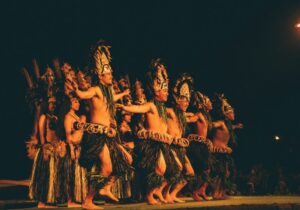 people hula dancing in honolulu at night
