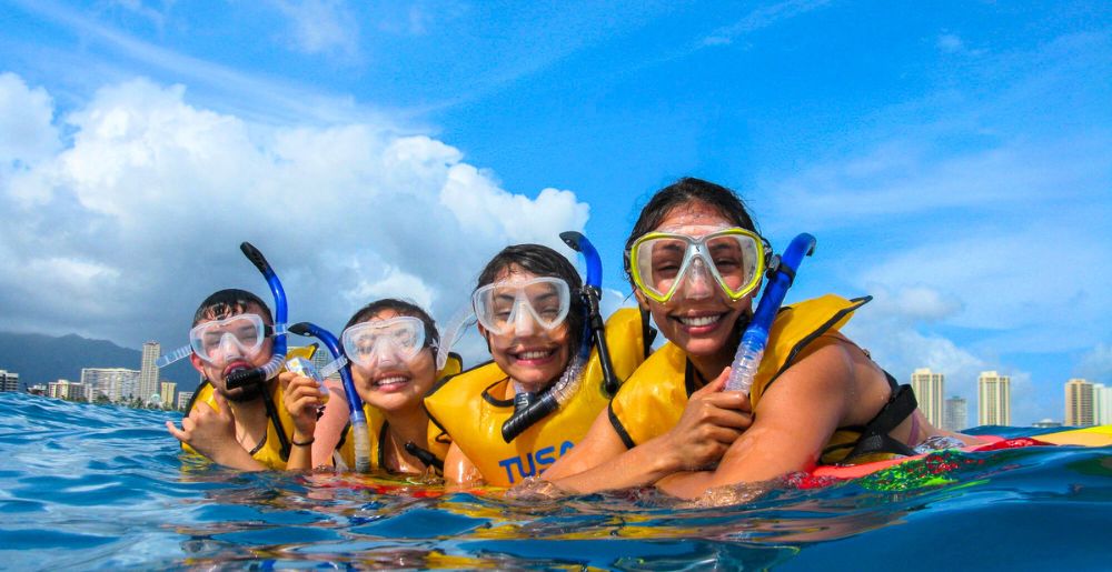 people wearing the best snorkel gear on a living ocean tour