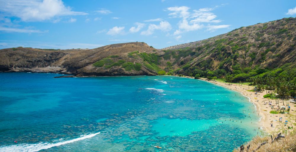 aerial view of the light blue water and beach of Hanauma Bay Oahu